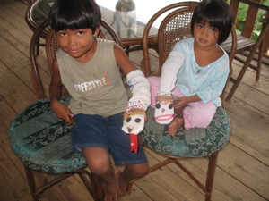 Sam and Cj with their puppets